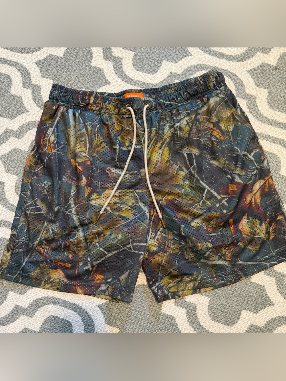 Negative Space Large mesh lined athletic active comfort lounge leaf print shorts